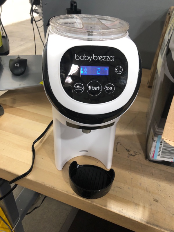 Photo 2 of Baby Brezza Formula Pro Mini Baby Formula Maker – Small Baby Formula Mixer Machine Fits Small Spaces and is Portable for Travel– Bottle Makers Makes The Perfect Bottle for Your Infant On The Go Formula Pro Mini Dispenser Machine