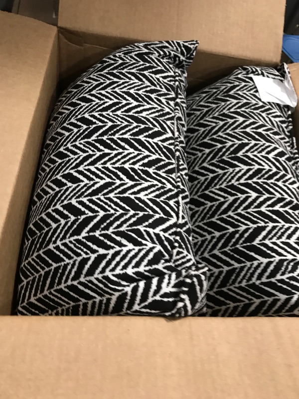 Photo 2 of *Used* Pillow Perfect 609805 Outdoor/Indoor Herringbone Night Lumbar Pillows, 11.5" x 18.5", Black, 2 Pack