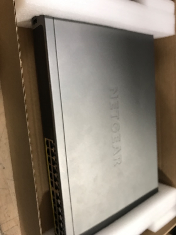 Photo 2 of NETGEAR 28-Port PoE Gigabit Ethernet Smart Switch (GS728TPP) - Managed, Optional Insight Cloud Management, 24 x PoE+ @ 380W, 4 x 1G SFP, Desktop or Rackmount, and Limited Lifetime Protection 28 port | 24xPoE+ 384W | 4xSFP