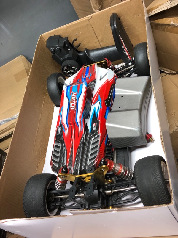 Photo 2 of GoolRC WLtoys 104001 RC Car, 1:10 Scale 2.4GHz Remote Control Car, 4WD 45km/h High Speed Racing Car, All Terrain Off-Road Buggy, Drift Car with Aluminum Alloy Chassis, Zinc Alloy Gear and 1 Battery