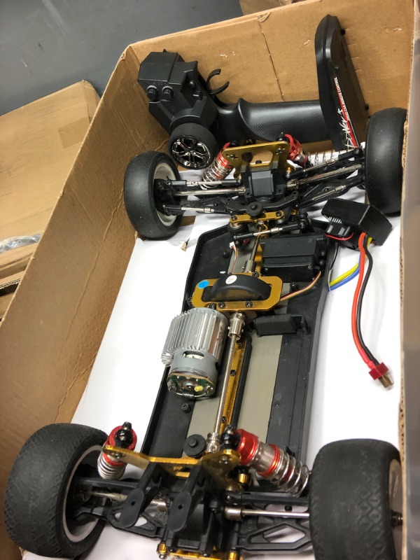 Photo 3 of GoolRC WLtoys 104001 RC Car, 1:10 Scale 2.4GHz Remote Control Car, 4WD 45km/h High Speed Racing Car, All Terrain Off-Road Buggy, Drift Car with Aluminum Alloy Chassis, Zinc Alloy Gear and 1 Battery