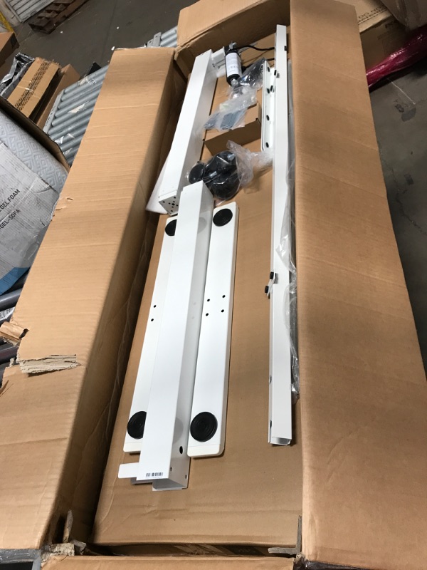 Photo 1 of Shintenchi Electric Standing Desk, 48 x 24 Inch Height Adjustable Sit Stand Desk Morder Home Office Stand Up Desk Computer Work Station with Splice Board, (White Frame + Black Top) 48X24 Black and White