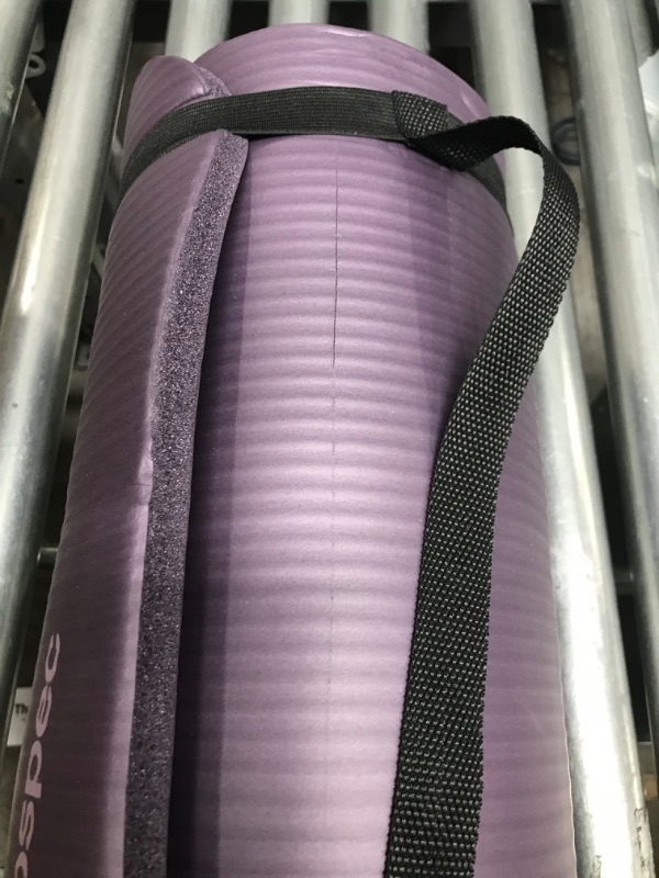 Photo 3 of **MINOR DAMAGE**Retrospec Retrospec Solana Yoga Mat 1/2" Thick w/ Nylon Strap for Men & Women - Non Slip Excercise Mat for Yoga, Pilates, Stretching, Floor & Fitness Workouts Eggplant 1/2 Inch