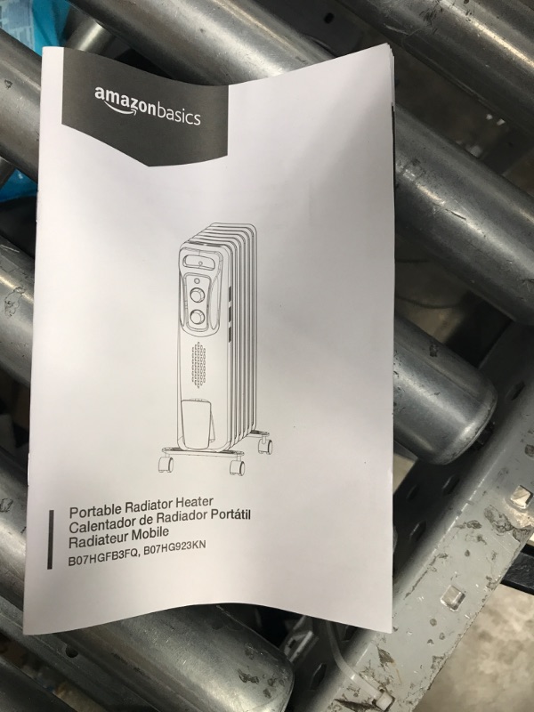 Photo 3 of ***NONFUNCTIONAL - FOR PARTS - SEE NOTES***
Amazon Basics Indoor Portable Radiator Heater - White