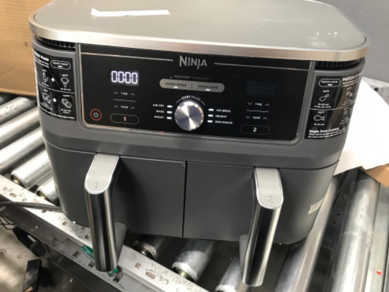 Photo 2 of Ninja DZ401 Foodi 10 Quart 6-in-1 DualZone XL 2-Basket Air Fryer with 2 Independent Frying Baskets, Match Cook & Smart Finish to Roast, Broil, Dehydrate & More for Quick, Easy Family-Sized Meals, Grey