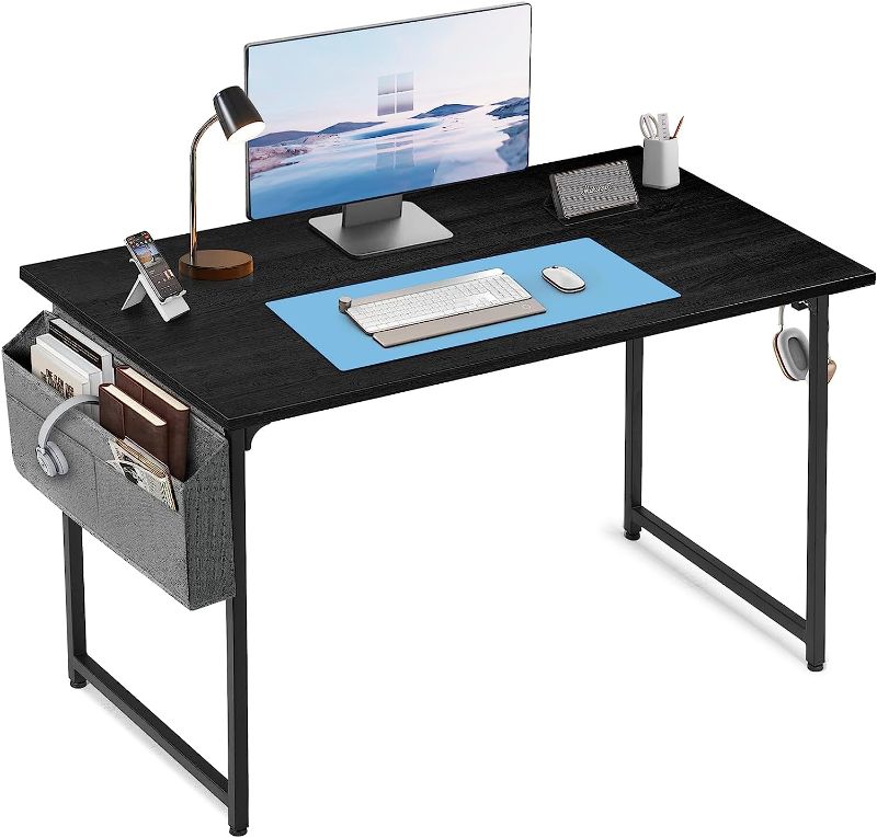 Photo 1 of COMHOMA Computer Desk, 47 Inch Home Office Desks with Storage Bag and Headphone Hook, Modern Simple Style Writing Study Work Computer Table (Carbon Black)
