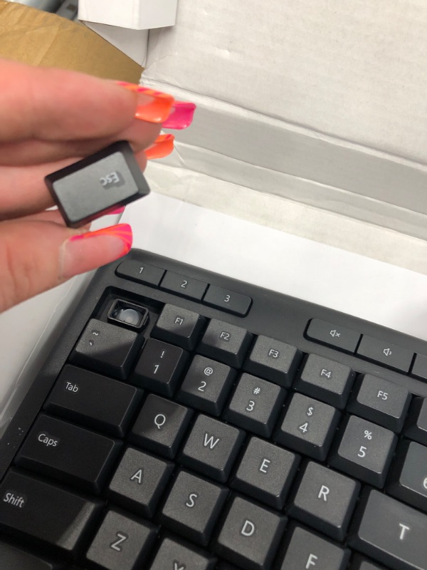 Photo 3 of Microsoft Ergonomic Keyboard - Black. Wired, Comfortable, Ergonomic Keyboard with Cushioned Wrist and Palm Support. Split Keyboard. Dedicated Office Key.