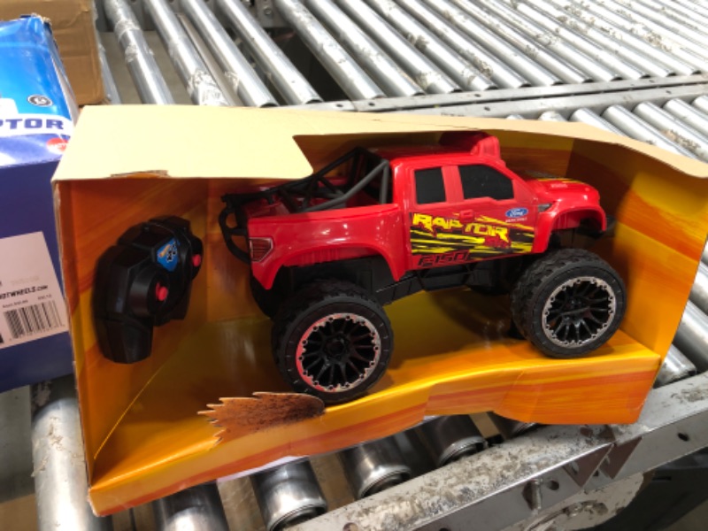 Photo 2 of ?Hot Wheels Remote Control Truck, Red Ford F-150 RC Vehicle With Full-Function Remote Control, Large Wheels & High-Performance Engine, 2.4 GHz With Range of 65 Feet HW FORD TRUCK RC