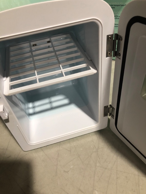 Photo 4 of **see images for damage**
 Retro 6-Can Personal Cooling and Heating Mini Refrigerator with Carry Handle for Home Office