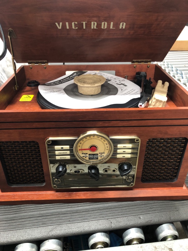 Photo 2 of 
Victrola VTA-250B-MAH 4-in-1 Nostalgic Bluetooth Record Player with 3-Speed Turntable FM Radio and Aux-in Mahogany
Color:Mahogany
Style:Record Player