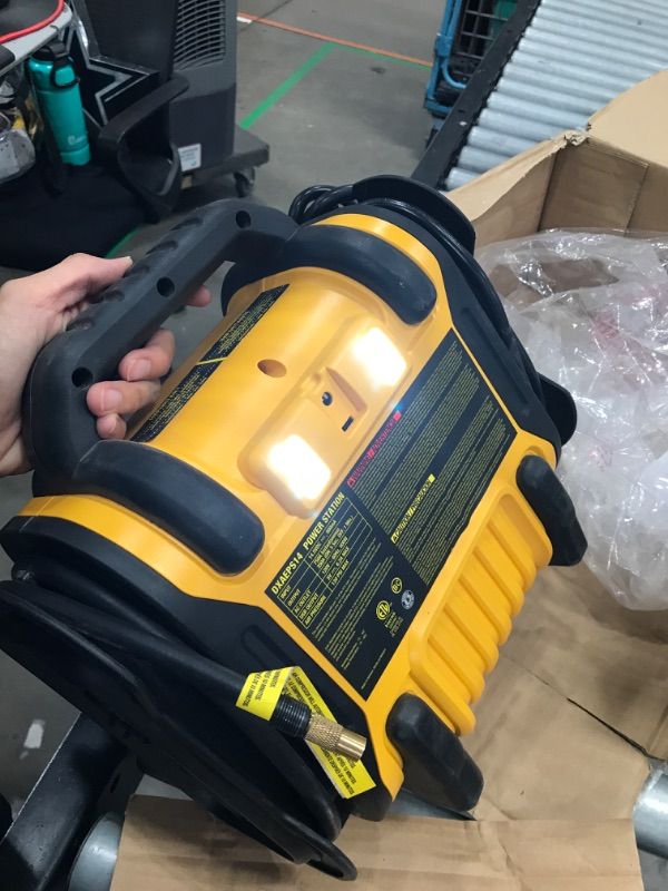 Photo 5 of DEWALT DXAEPS14 1600 Peak Battery Amp 12V Automotive Jump Starter/Power Station with 500 Watt AC Power Inverter, 120 PSI Digital Compressor, and USB Power , Yellow