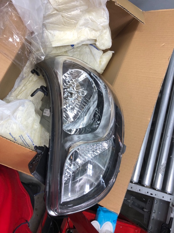 Photo 2 of TYC Left Headlight Assembly Compatible with 2012-2014 Hyundai Accent Driver