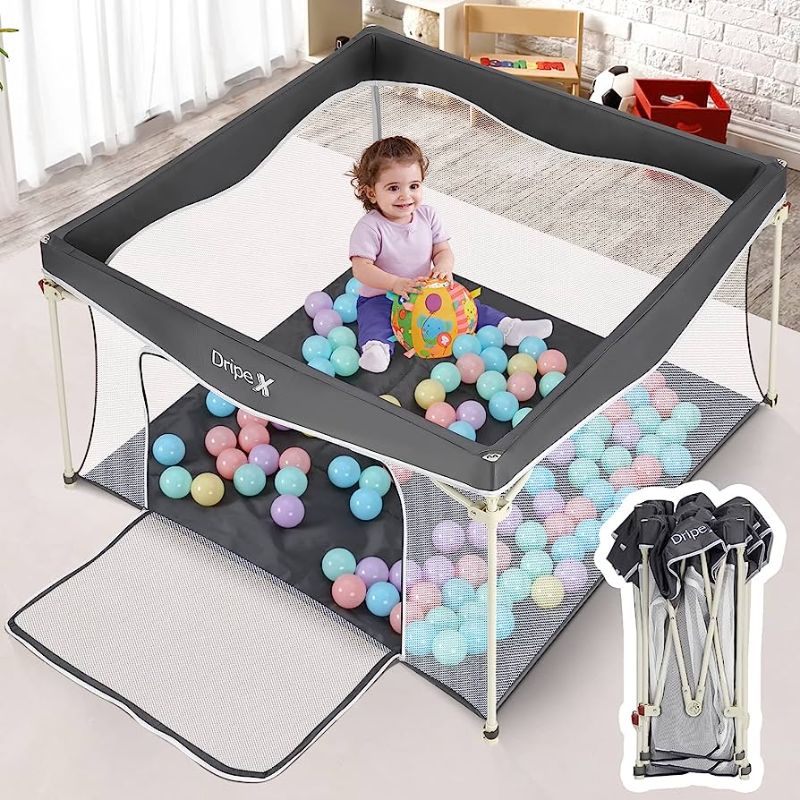 Photo 1 of black Rompico foldable play pen

