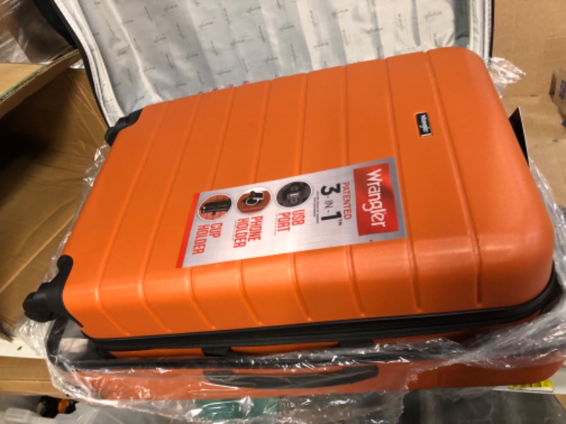 Photo 4 of * see images for damage *
Wrangler Smart Luggage Set with Cup Holder and USB Port, Burnt Orange, 3 Piece 3 Piece Set Burnt Orange