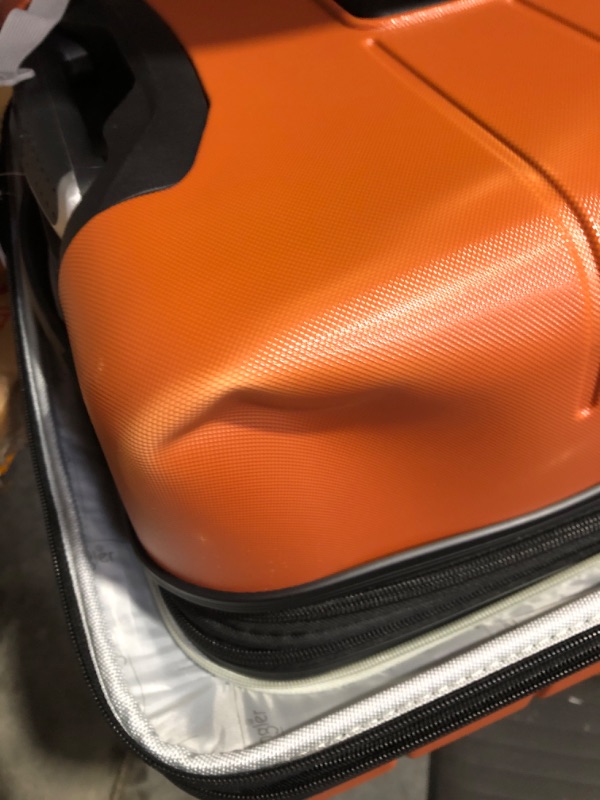 Photo 6 of * see images for damage *
Wrangler Smart Luggage Set with Cup Holder and USB Port, Burnt Orange, 3 Piece 3 Piece Set Burnt Orange