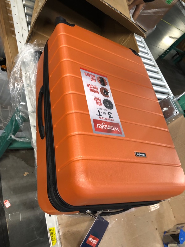 Photo 3 of * see images for damage *
Wrangler Smart Luggage Set with Cup Holder and USB Port, Burnt Orange, 3 Piece 3 Piece Set Burnt Orange