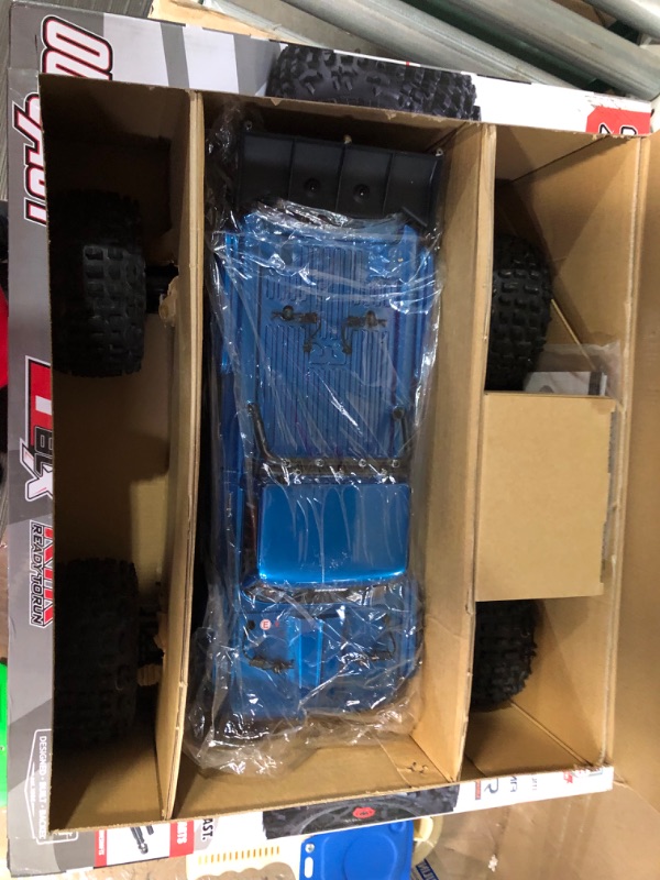 Photo 3 of ARRMA RC Truck 1/10 Outcast 4X4 4S V2 BLX Stunt Truck RTR (Batteries and Charger Not Included) Blue, ARA4410V2T2