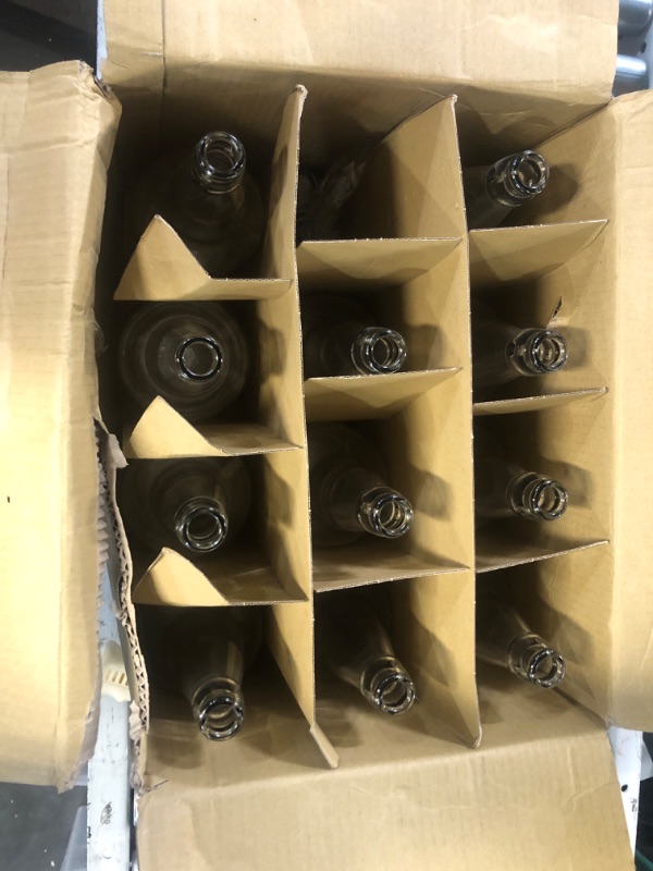 Photo 2 of ***missing one bottle***Midwest Homebrewing and Winemaking Supplies CASE OF 12 - 32 oz. EZ Cap Beer Bottles, Clear