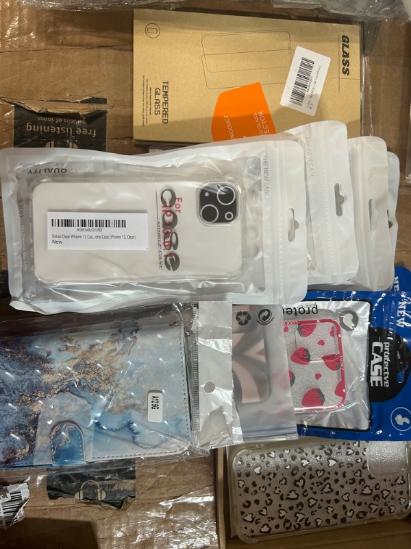 Photo 1 of **MISCELLANEOUS PHONE CASE/SCREEN PROTECTOR BUNDLE**
