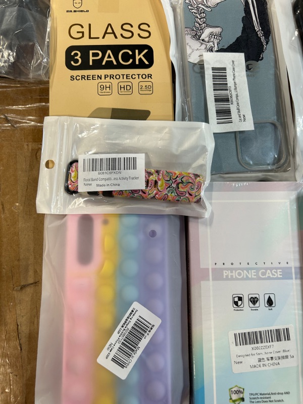 Photo 2 of **MISCELLANEOUS PHONE CASE/SCREEN PROTECTOR BUNDLE**
