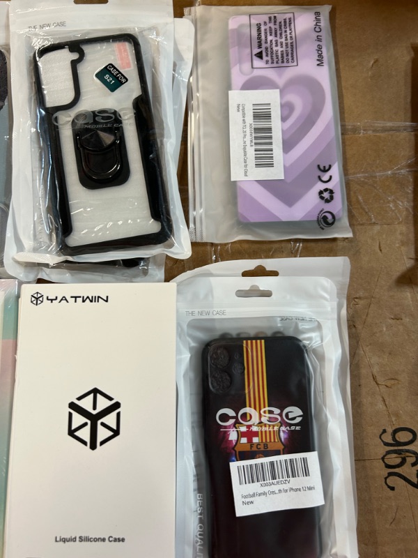 Photo 1 of **MISCELLANEOUS PHONE CASE/SCREEN PROTECTOR BUNDLE**
