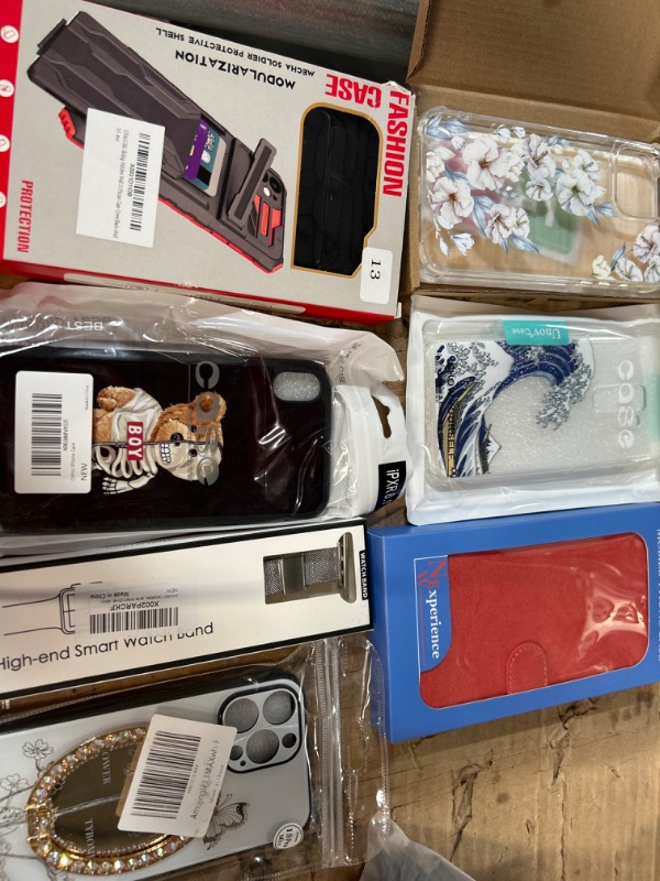 Photo 1 of **MISCELLANEOUS PHONE CASE BUNDLE**