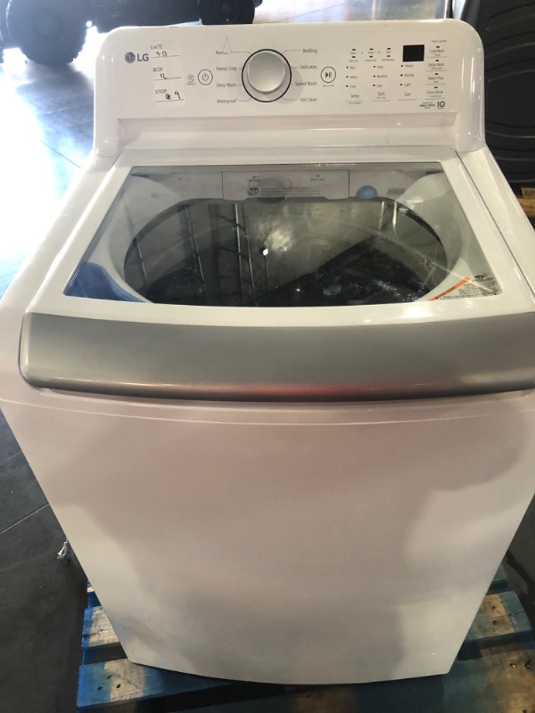 Photo 1 of **USED, TESTED POWERS ON** HAS A DENT  LG 5.0 cu. ft. Mega Capacity Top Load Washer with TurboDrum™ Technology