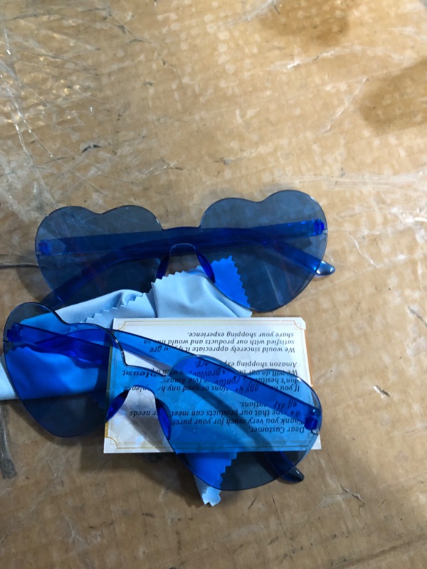 Photo 1 of 2 blue sunglasses 