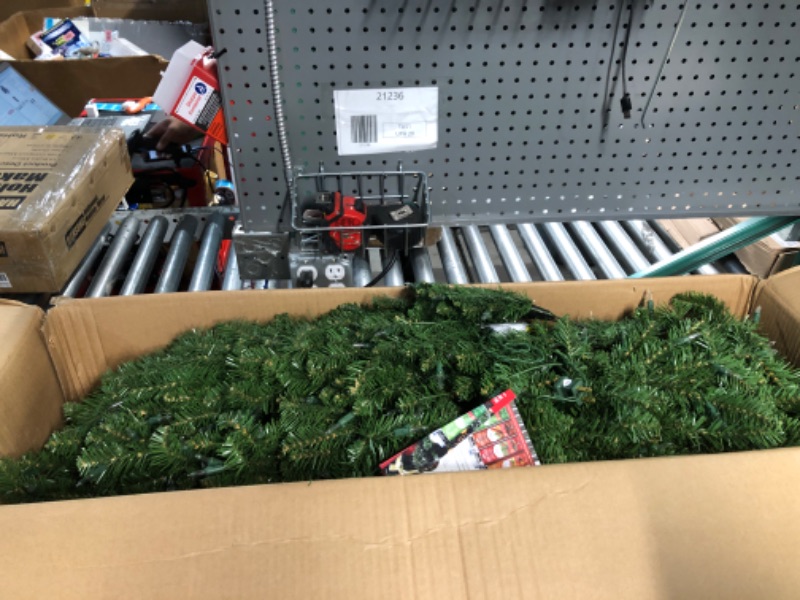 Photo 2 of (USED AND NONRURNTABLE) 9’ Pre-lit Kingswood Fir Pencil Artificial Christmas Tree –Clear Lights