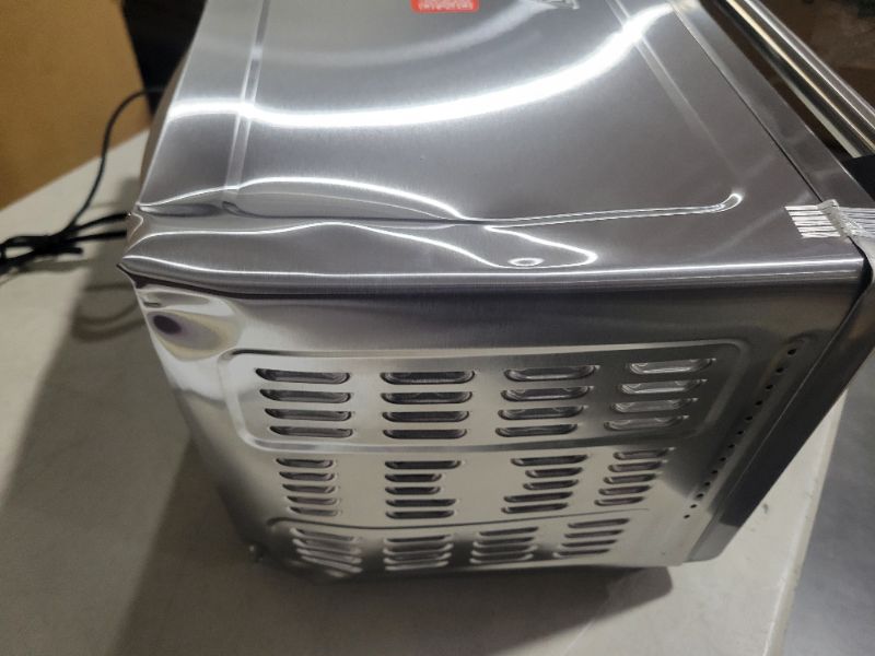 Photo 4 of **SEE NOTES/DAMAGED**
Emeril Lagasse Power Air Fryer 360 Better Than Convection Ovens Hot Air Fryer Oven, Toaster Oven, Bake, Broil, Slow Cook and More Food Dehydrator, Rotisserie Spit, Pizza Function Cookbook Included (Stainless Steel)