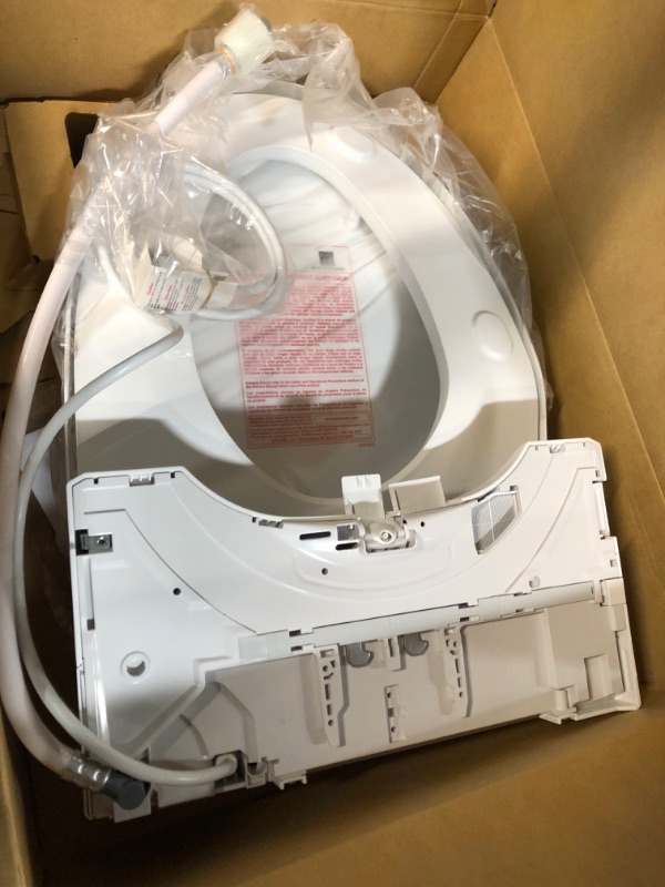 Photo 3 of ***LIGHTS UP WHEN PLUGGED IN - UNABLE TO TEST FURTHER***
TOTO SW3084#01 WASHLET C5 Electronic Bidet Toilet Seat with PREMIST and EWATER+ Wand Cleaning