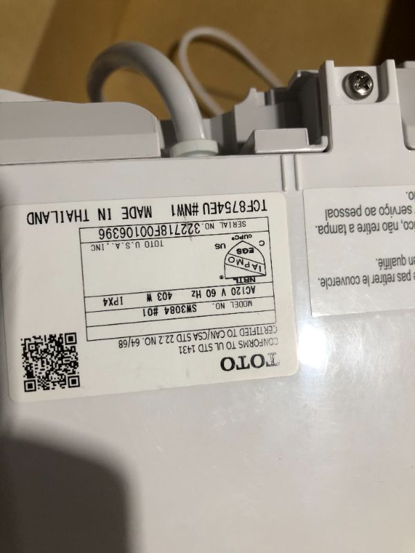 Photo 6 of ***LIGHTS UP WHEN PLUGGED IN - UNABLE TO TEST FURTHER***
TOTO SW3084#01 WASHLET C5 Electronic Bidet Toilet Seat with PREMIST and EWATER+ Wand Cleaning