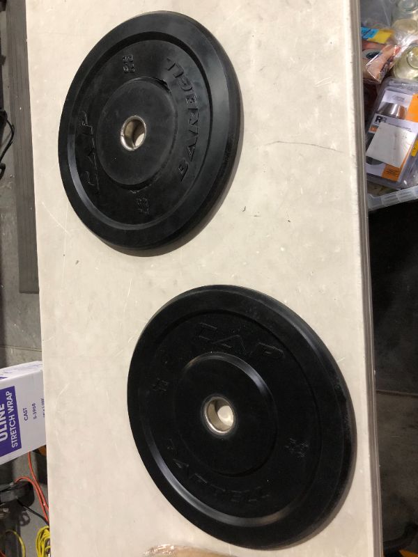 Photo 2 of ***ONE OF THE PLATES HAS MAJOR DAMAGE - SEE PICTURES***
CAP Barbell Premium Bumper Plate Set 15 lb Pair Set