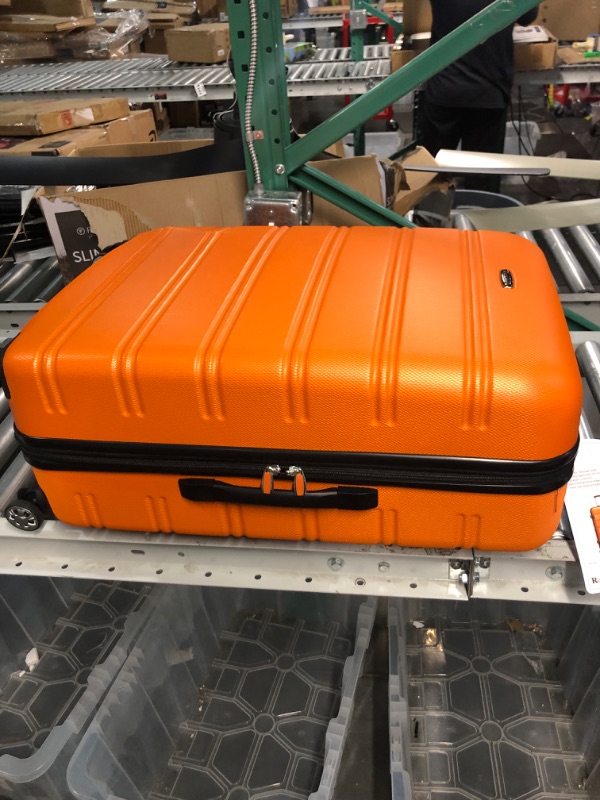 Photo 3 of * used * damaged * see images *
Rockland Melbourne Hardside Expandable Spinner Wheel Luggage, Orange, Checked-Large 28-Inch