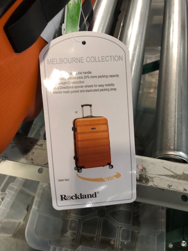 Photo 2 of * used * damaged * see images *
Rockland Melbourne Hardside Expandable Spinner Wheel Luggage, Orange, Checked-Large 28-Inch