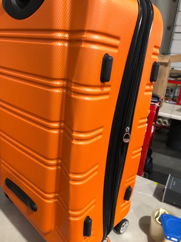 Photo 4 of * used * damaged * see images *
Rockland Melbourne Hardside Expandable Spinner Wheel Luggage, Orange, Checked-Large 28-Inch