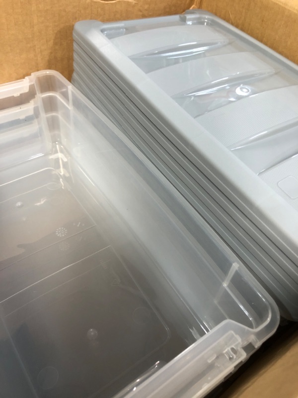 Photo 3 of * used * some boxes are damaged * 
Amazon Basics 5 Quart Stackable Plastic Storage Bins with Latching Lids- Clear/ Grey- Pack of 10 5 Qt. - 10 Pack