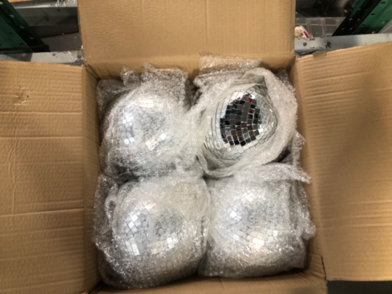 Photo 2 of **MAJOR DAMAGE TO ONE AND MINOR DAMAGE TO ANOTHER GLOBE** 4 Pack Large Disco Ball Silver Hanging Disco Balls Reflective Mirror Ball Ornament for Party Holiday Wedding Dance and Music Festivals Decor Club Stage Props DJ Decoration (8 Inch)