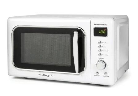 Photo 1 of *Used* *Stain inside* Nostalgia CLMO7WH Classic Retro 0.7 Cu. ft. 700 W Countertop Microwave Oven With LED Display, White