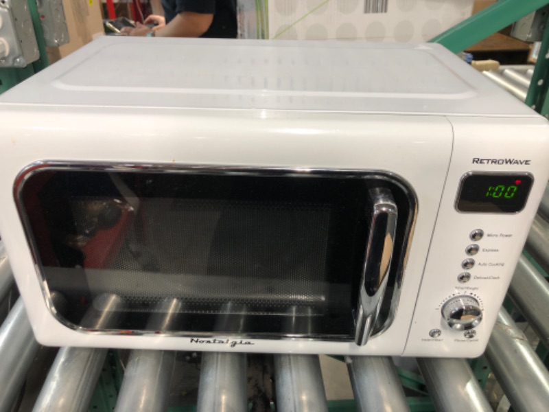 Photo 2 of *Used* *Stain inside* Nostalgia CLMO7WH Classic Retro 0.7 Cu. ft. 700 W Countertop Microwave Oven With LED Display, White