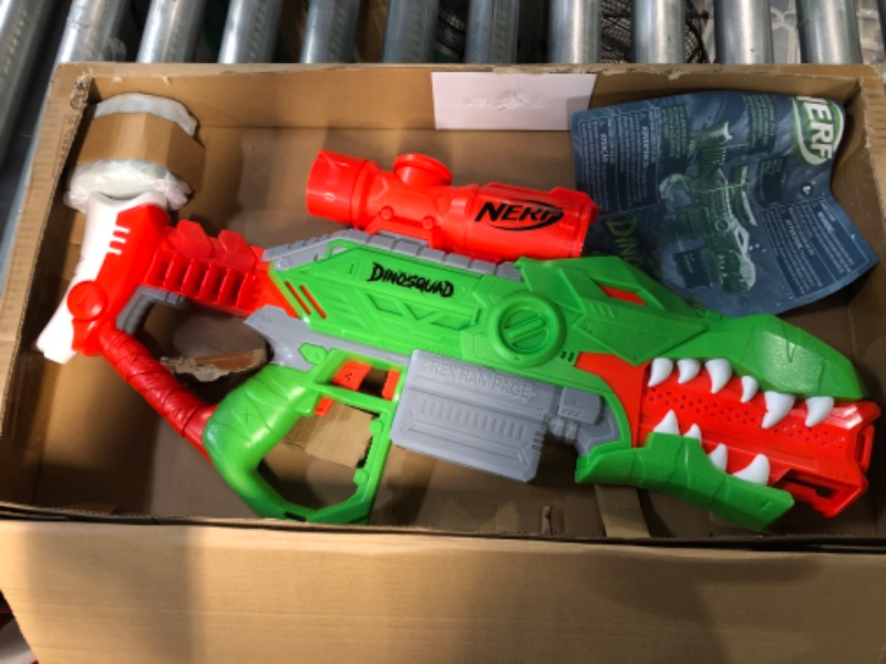 Photo 2 of * missing clip for darts *
NERF DinoSquad Rex-Rampage Motorized Dart Blaster, 10-Dart Clip, 