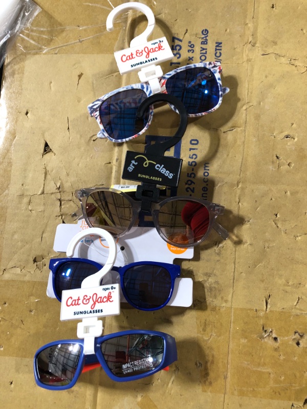 Photo 1 of ASSORTED KIDS SUN GLASSES