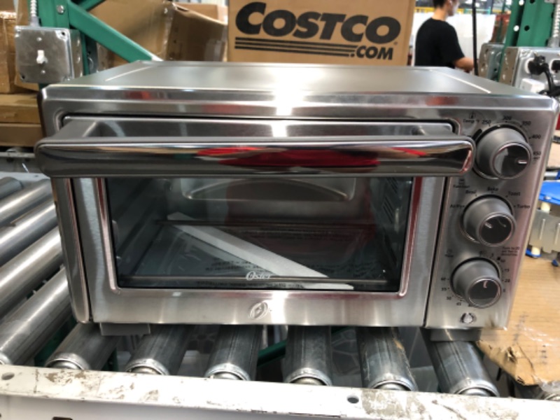 Photo 2 of **FOR PARTS OR REPAIR**
Oster Compact Countertop Oven With Air Fryer, Stainless Steel