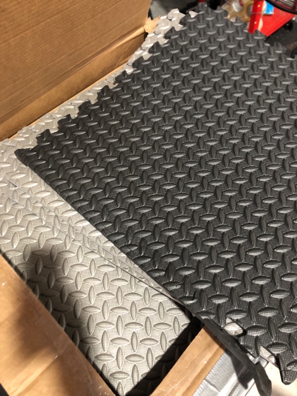 Photo 2 of * items mismatched * and minor damage * see images *
ProsourceFit Puzzle Exercise Mat ½”, EVA Foam Interlocking Tiles, Protective Flooring for Gym Equipment 