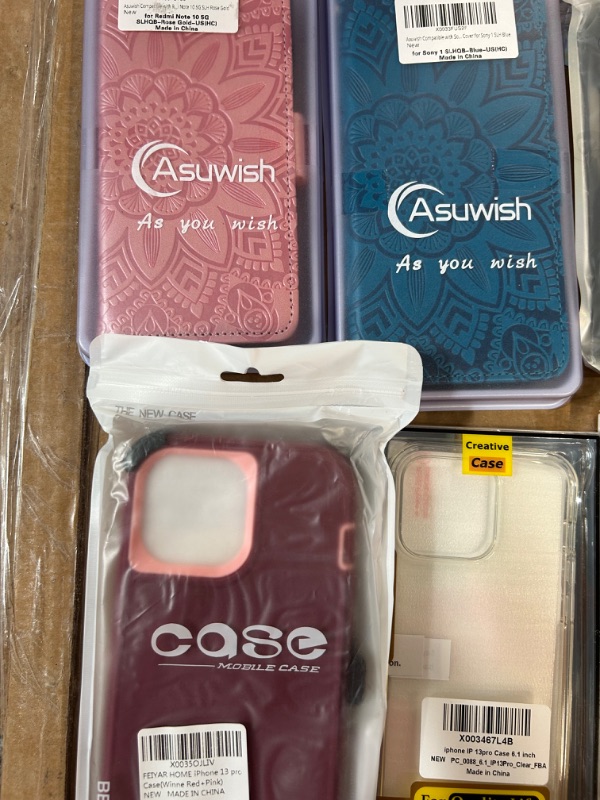 Photo 2 of **MISCELLANEOUS PHONE CASE  BUNDLE**
