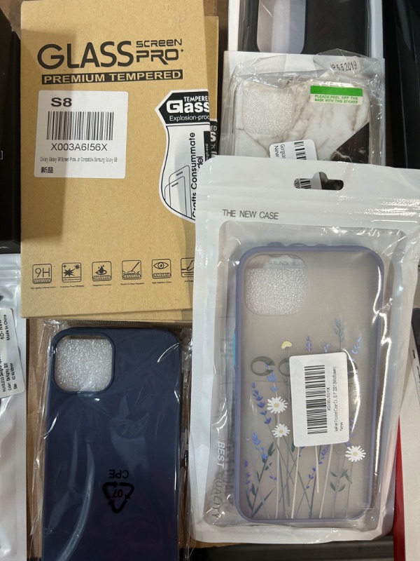 Photo 1 of **MISCELLANEOUS PHONE CASE/PROTECTOR  BUNDLE**
