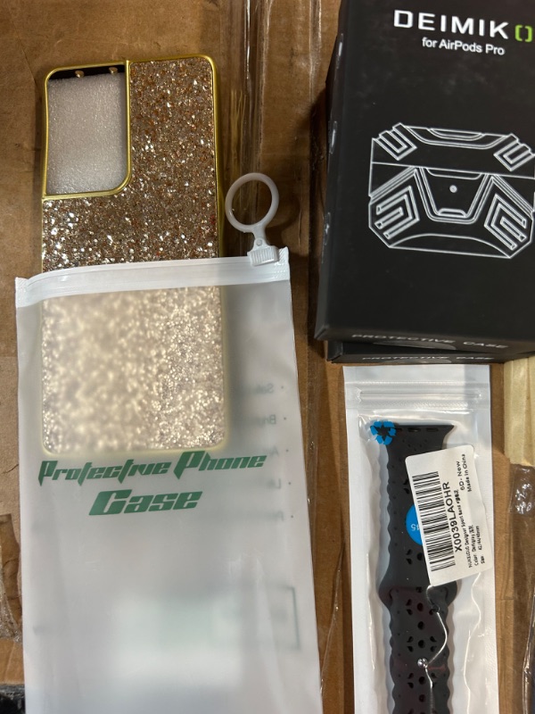 Photo 1 of **MISCELLANEOUS PHONE CASE/PROTECTOR  BUNDLE**
