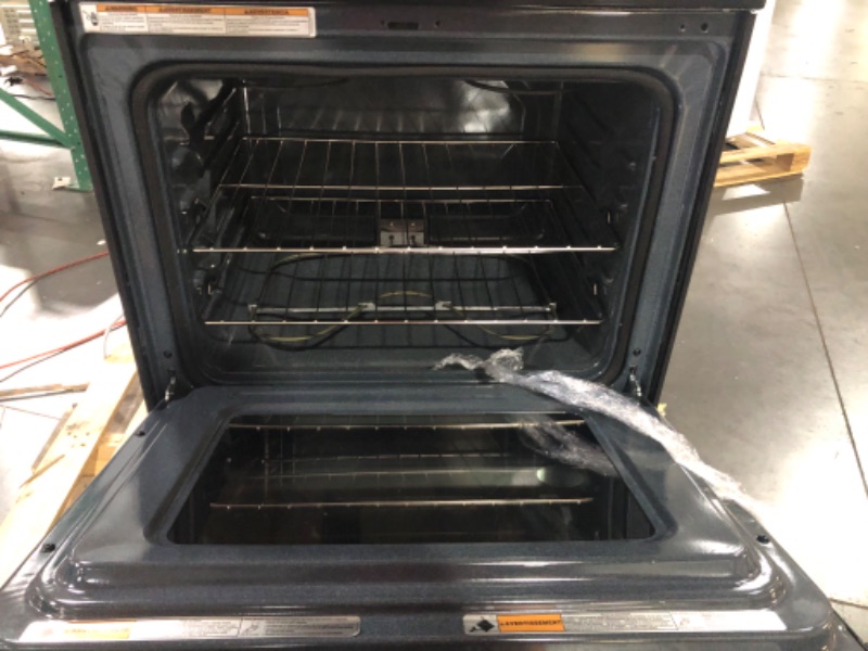 Photo 4 of Whirlpool 30-in Smooth Surface 4 Elements 5.3-cu ft Freestanding Electric Range (Black)