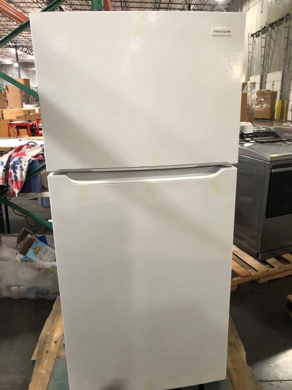 Photo 2 of **MINOR DENTS AND SCRATCHES SEE LAST TWO PHOTOS**
Frigidaire 18.3 Cu. Ft. Top Freezer Refrigerator MODEL #: FFTR1814WW SERIAL #:BA33026569
