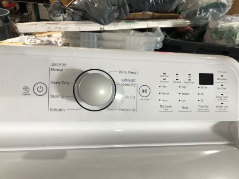 Photo 1 of *MINOR DAMAGE SEE NOTES-MISSING POWER ADAPTERS*
7.3 cu. ft. Ultra Large Capacity Electric Dryer with Sensor Dry Technology MODEL #: DLE7150W SERIAL #: 306KWWZ69033